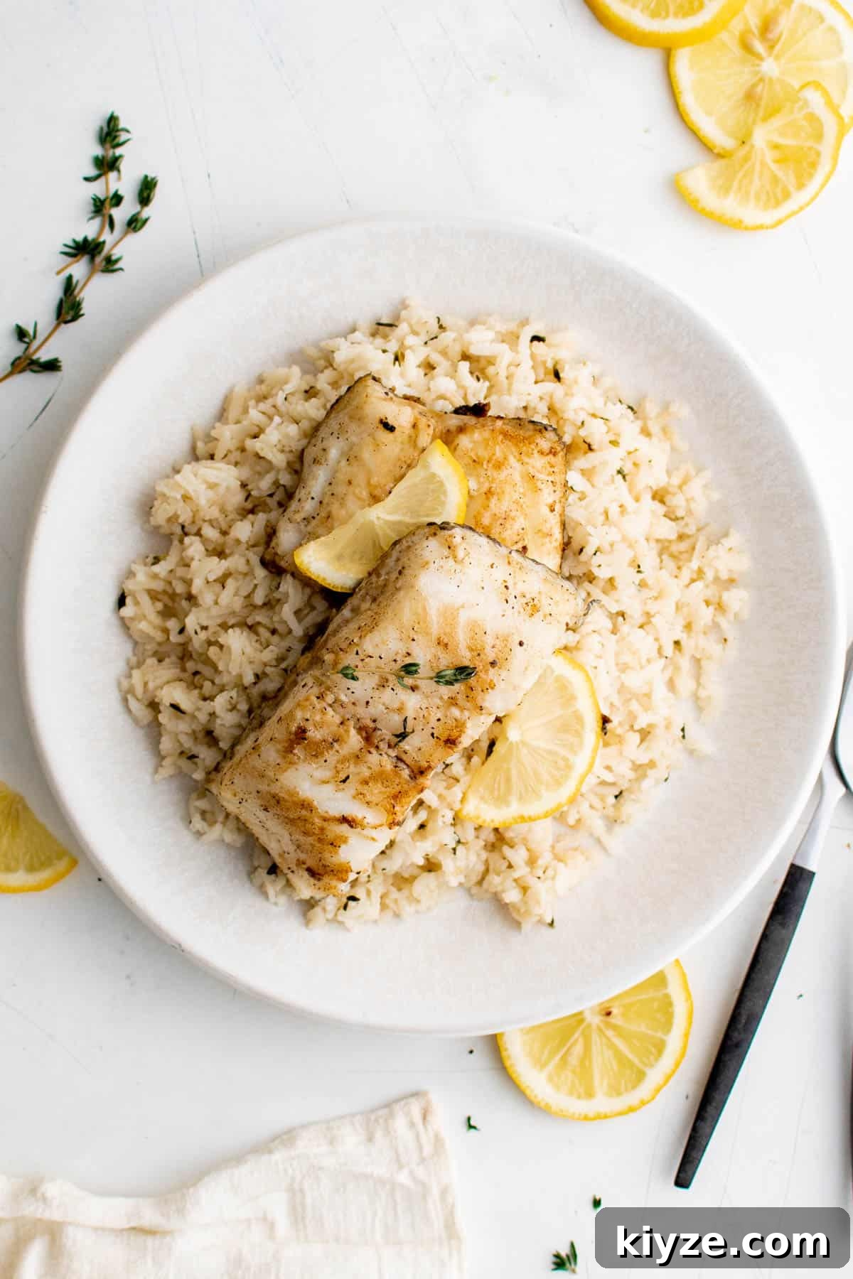 a plate with garlic and herb rice and chilean sea bass