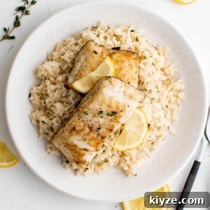 a plate with garlic and herb rice and chilean sea bass