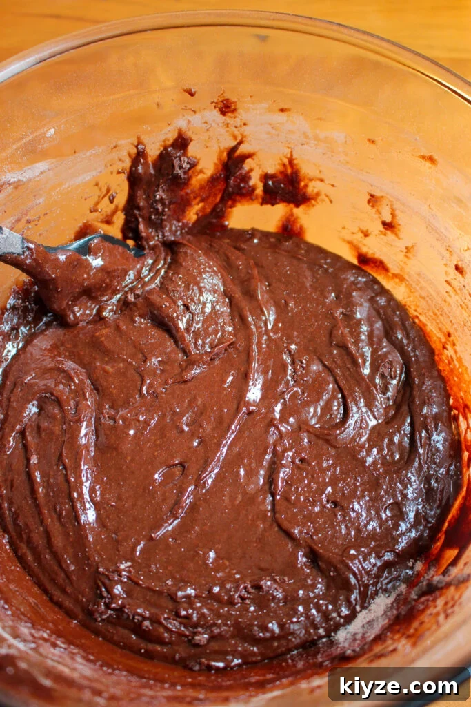Fudgy Brownie Muffins Recipe: Chocolate Muffins with Gooey Centers 11 Thick brownie batter