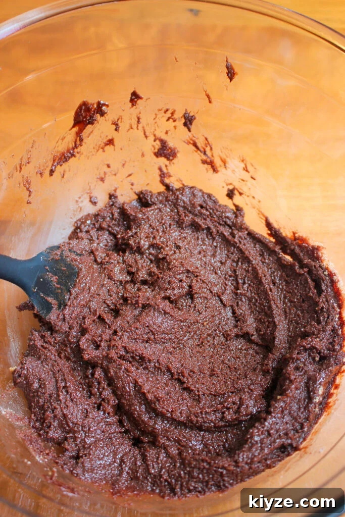 Fudgy Brownie Muffins Recipe: Chocolate Muffins with Gooey Centers 5 Thick batter