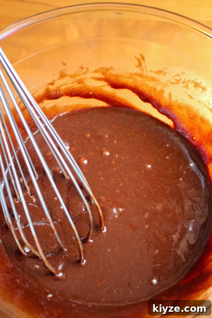 Fudgy Brownie Muffins Recipe: Chocolate Muffins with Gooey Centers 9 Batter with bubbles