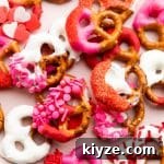pretzels decorated for valentines day with sprinkles