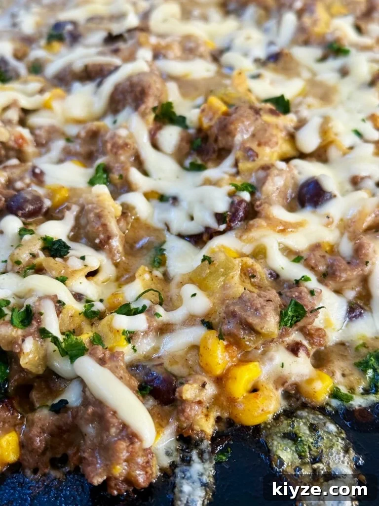 Blackstone Beef Enchiladas with Melted Cheese and Salsa Verde 8 Blackstone Lazy Beef Enchiladas