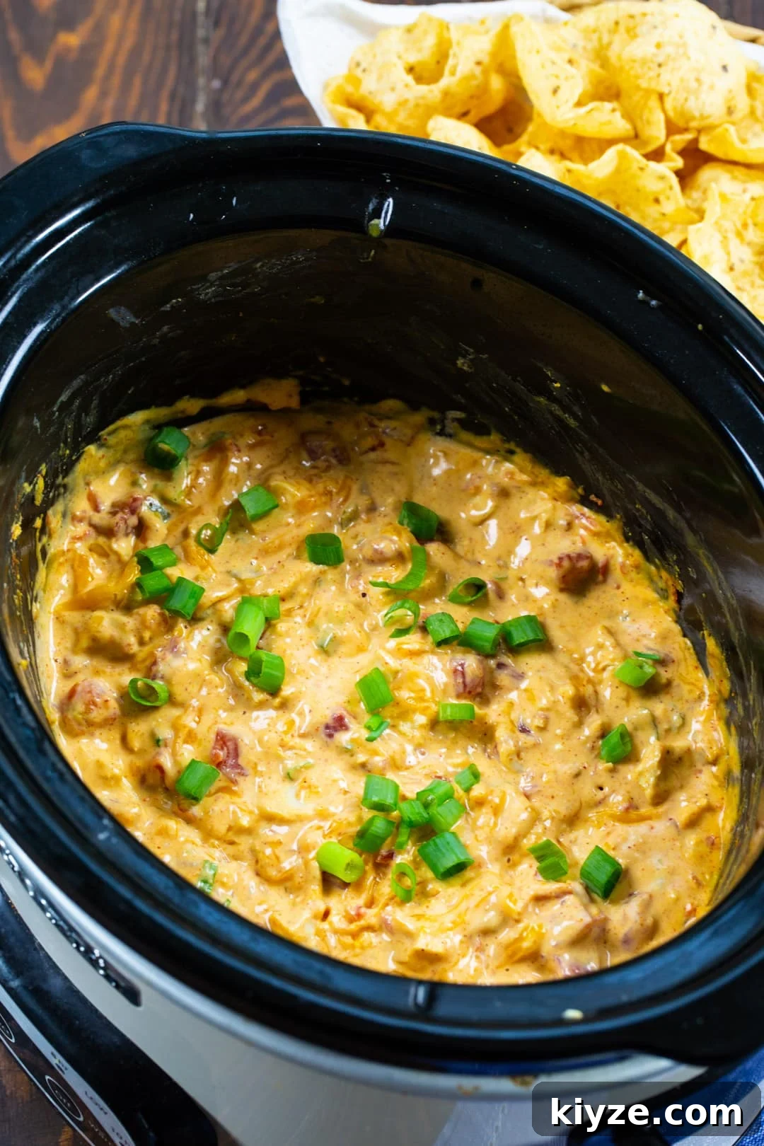 Slow Cooker Chicken Nacho Dip in slow cooker.