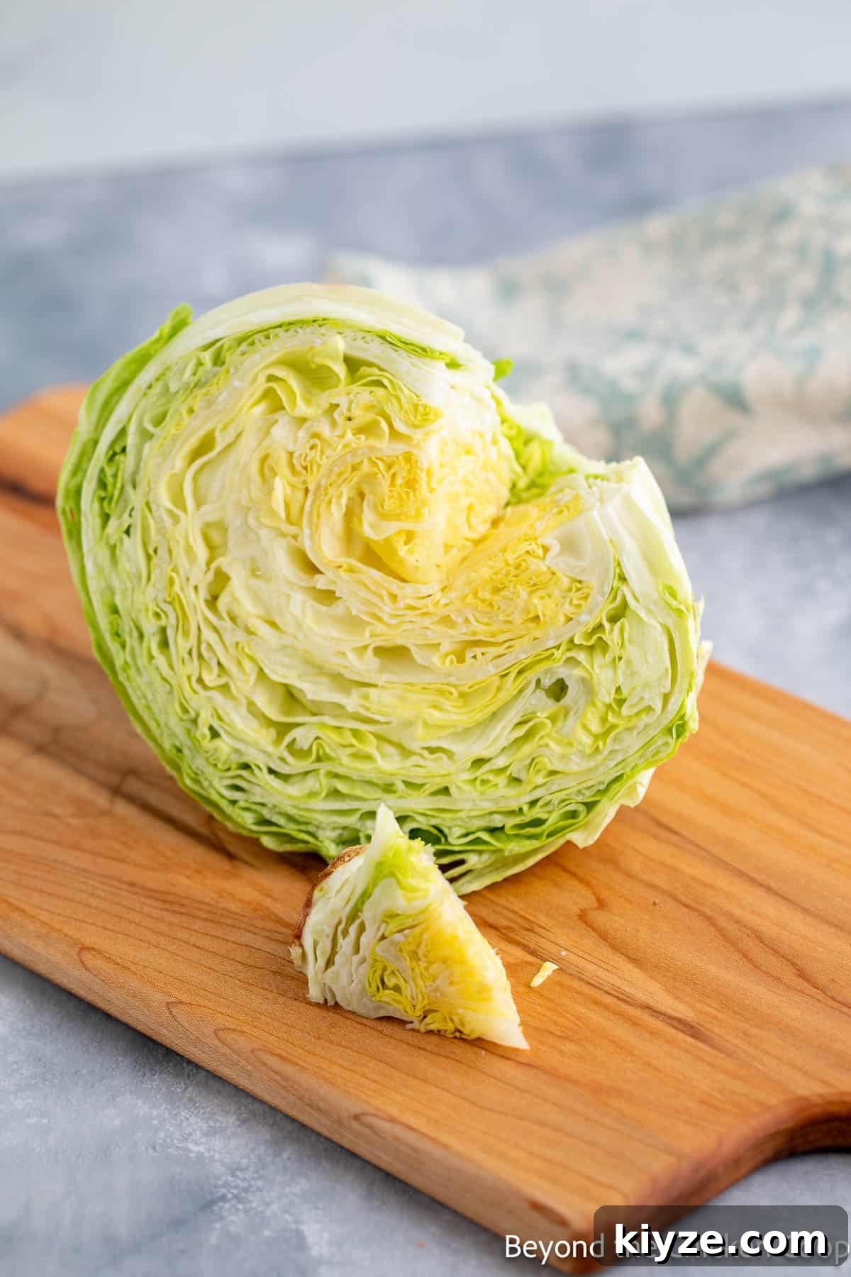 Classic Blue Cheese Wedge Salad with Crispy Bacon and Dressing 4 Half of a head of lettuce with the core removed.