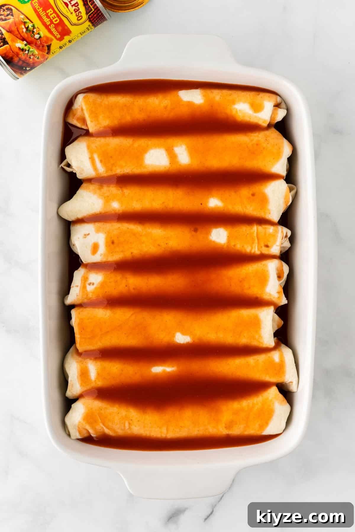 Sweet Potato and Black Bean Enchiladas with Chipotle Sauce 13 enchilada sauce poured over the enchiladas