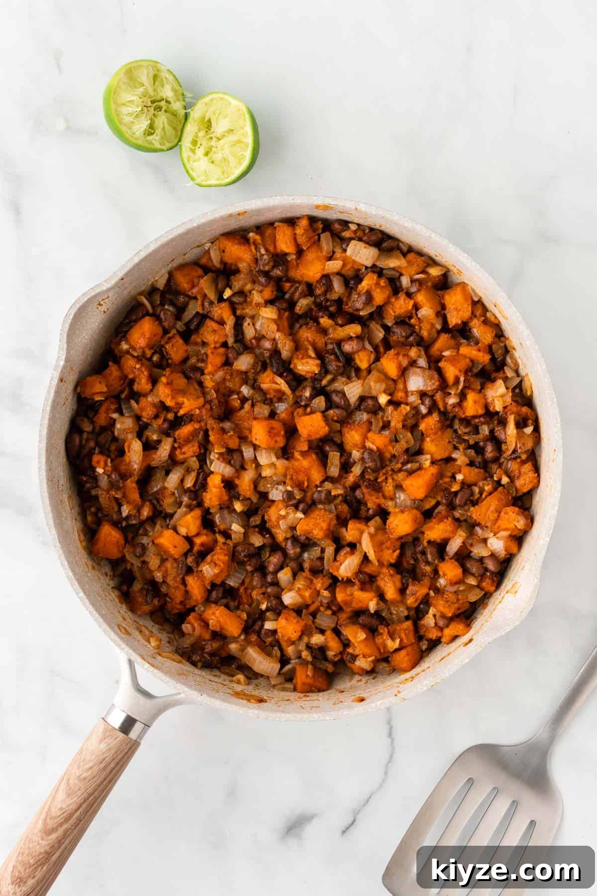 Sweet Potato and Black Bean Enchiladas with Chipotle Sauce 10 enchilada filling in a skillet