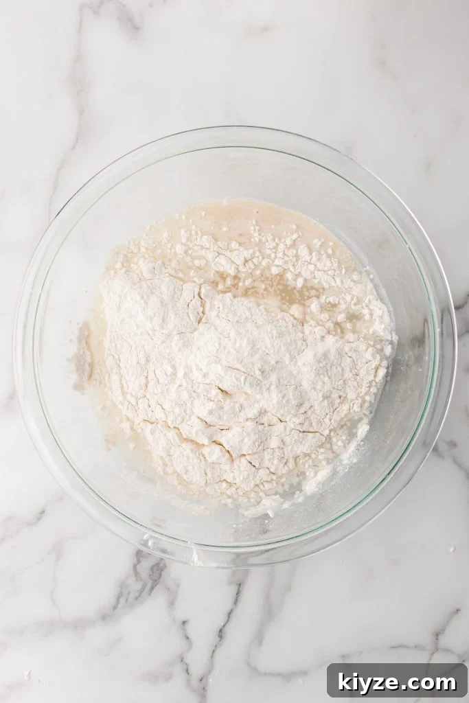 30-Minute Crusty Baguettes: Foolproof Recipe for Homemade Bread 6 flour, yeast, and water in a large glass mixing bowl