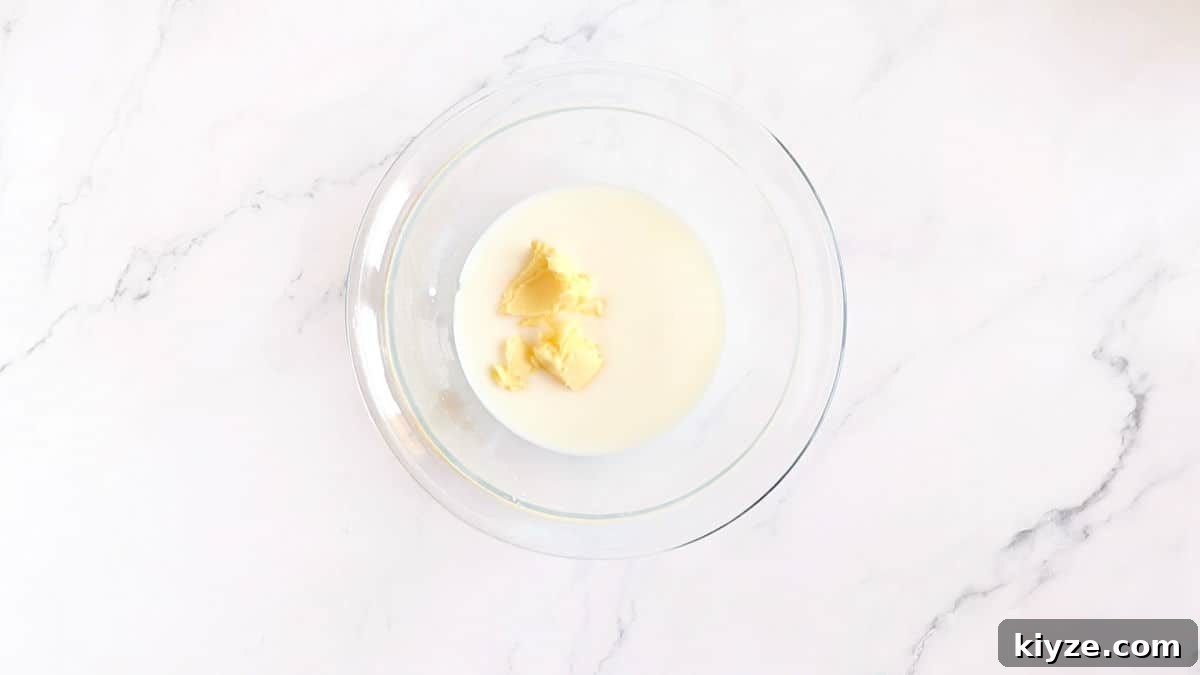Bunny-Shaped Cinnamon Rolls: Cute Recipe for Spring Brunch 5 butter, water and milk in a bowl