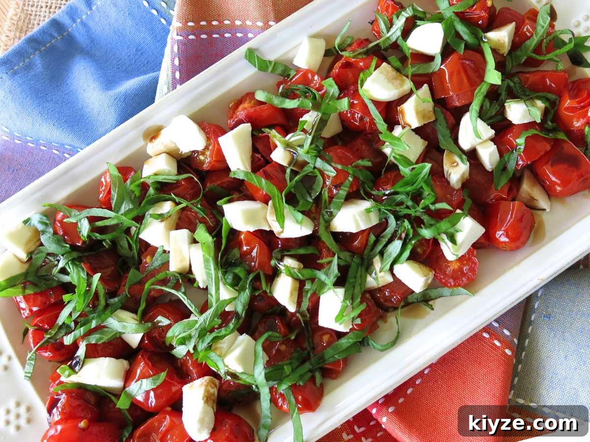 Rectangle platter with grape tomato caprese salad.