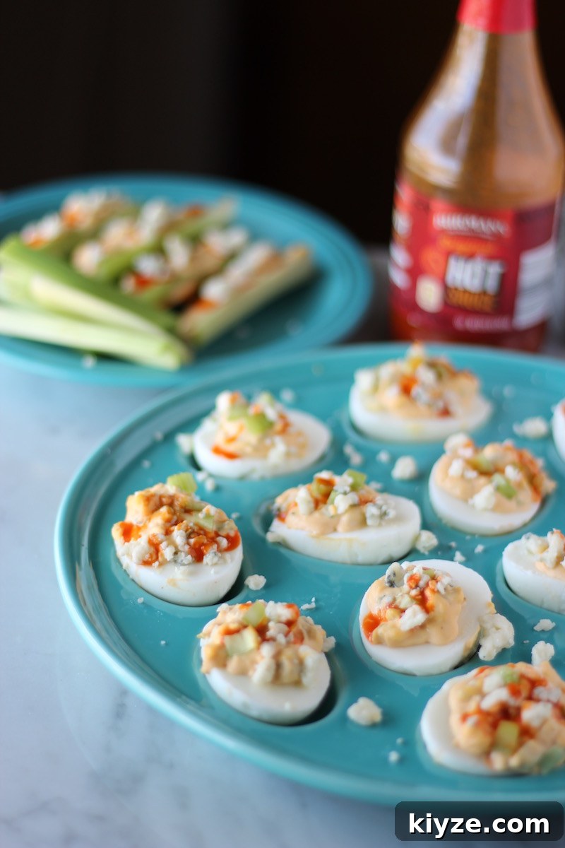 Spicy Buffalo Deviled Eggs Recipe for Game Day and Parties 14 Buffalo Deviled Eggs - celery, blue cheese, and hot sauce take deviled eggs up a notch! So easy to make and super yummy! | fedandfulfilled.com