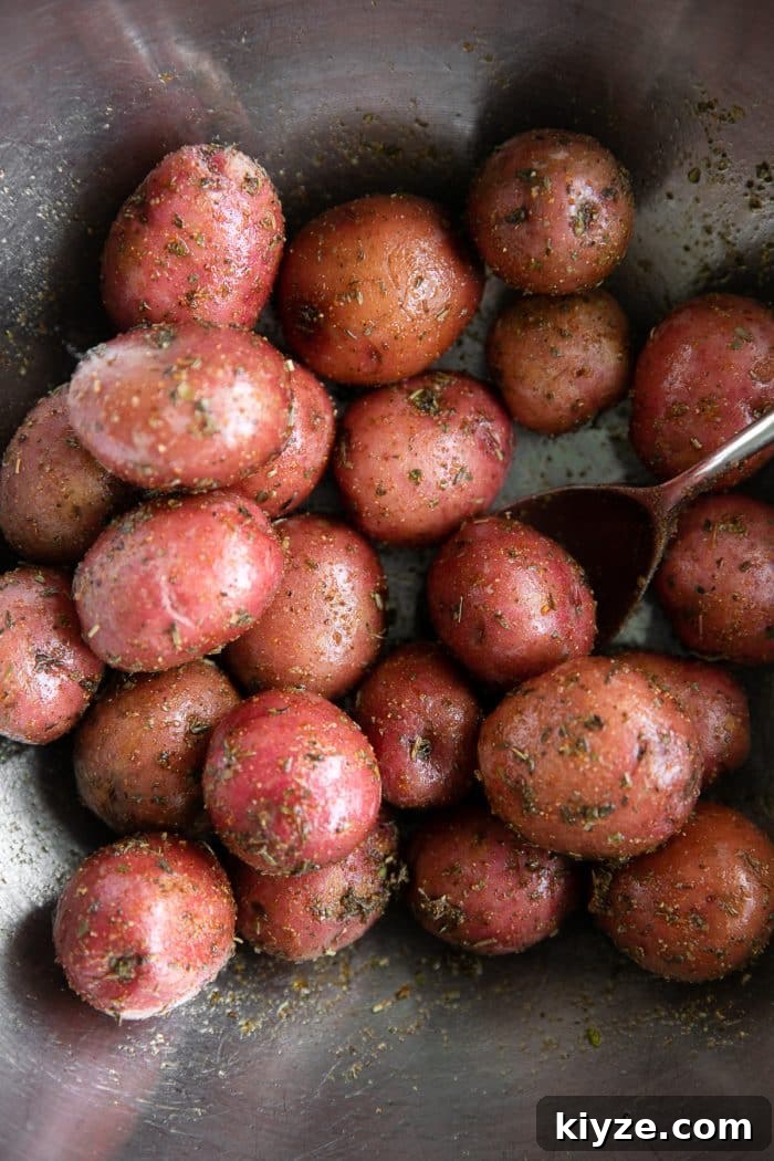Instant Pot Chicken and Potatoes Dinner Recipe 4 Small red potatoes tossed in olive oil and seasoning.