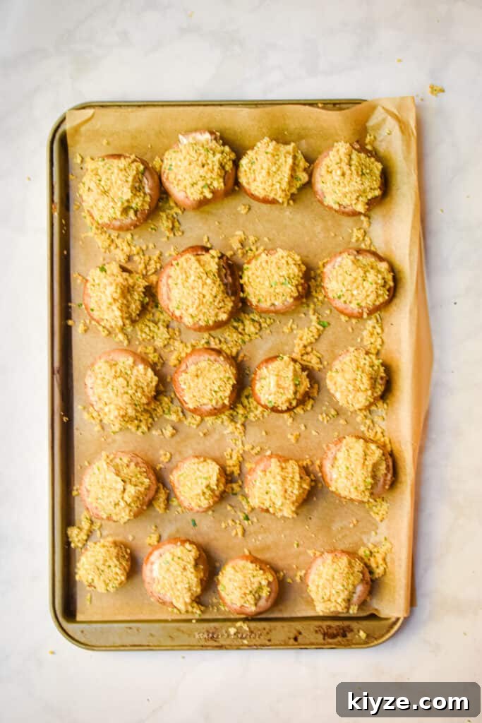The mushrooms are stuffed and ready for the oven