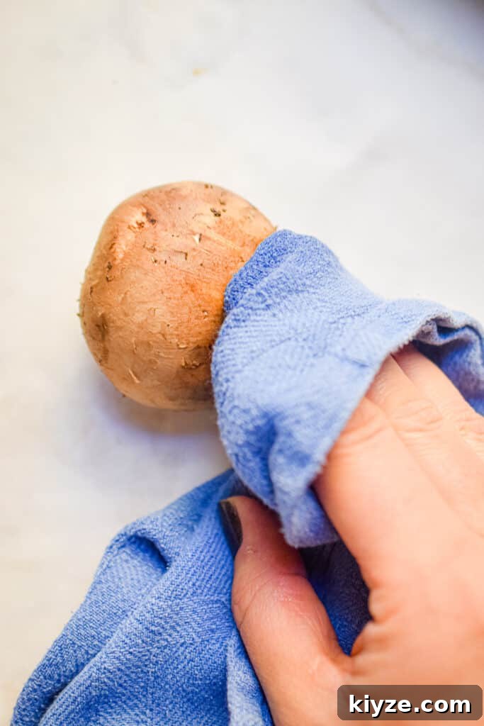 A mushroom is being washed