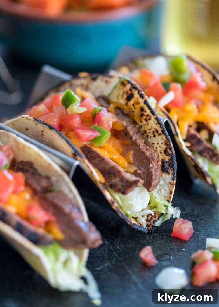 Cilantro-Lime Flank Steak Tacos with Charred Onions 3 Flank Steak Tacos