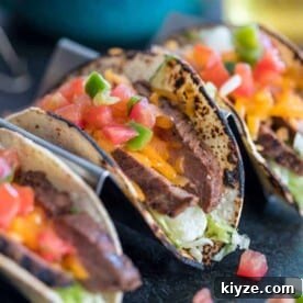 Cilantro-Lime Flank Steak Tacos with Charred Onions 7 Flank Steak Tacos