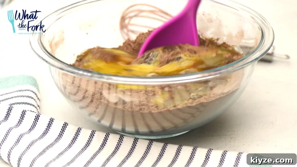 One-Bowl Fudgy Gluten-Free Brownies Recipe 8 Add eggs to dry ingredients and beat well. Then add the rest of the wet ingredients.