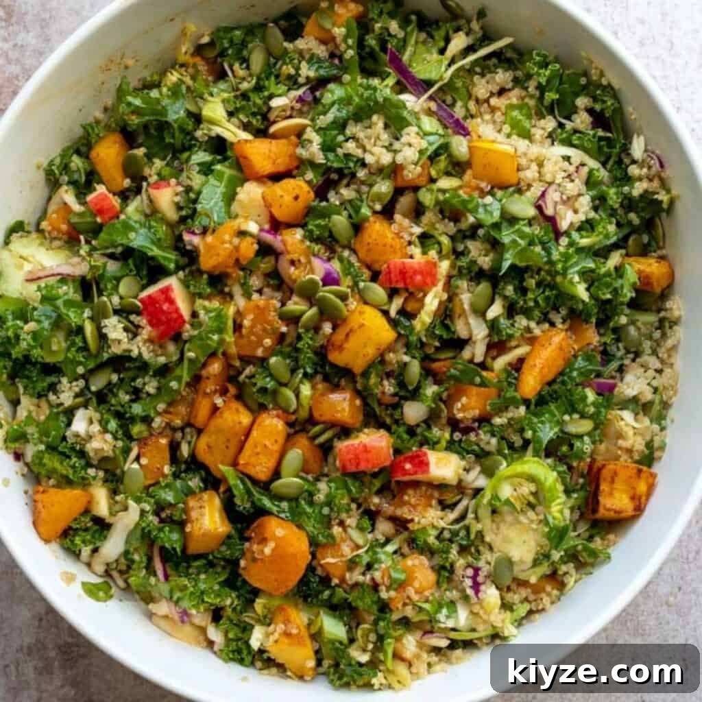Autumn Harvest Salad with Roasted Squash, Apples & Maple Vinaigrette 6 Fall Harvest Salad in a large white bowl.
