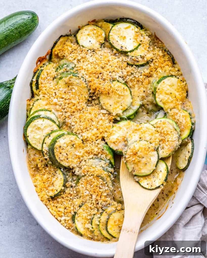 wooden spoon on zucchini casserole dish