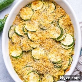 top view of zucchini casserole in a white dish
