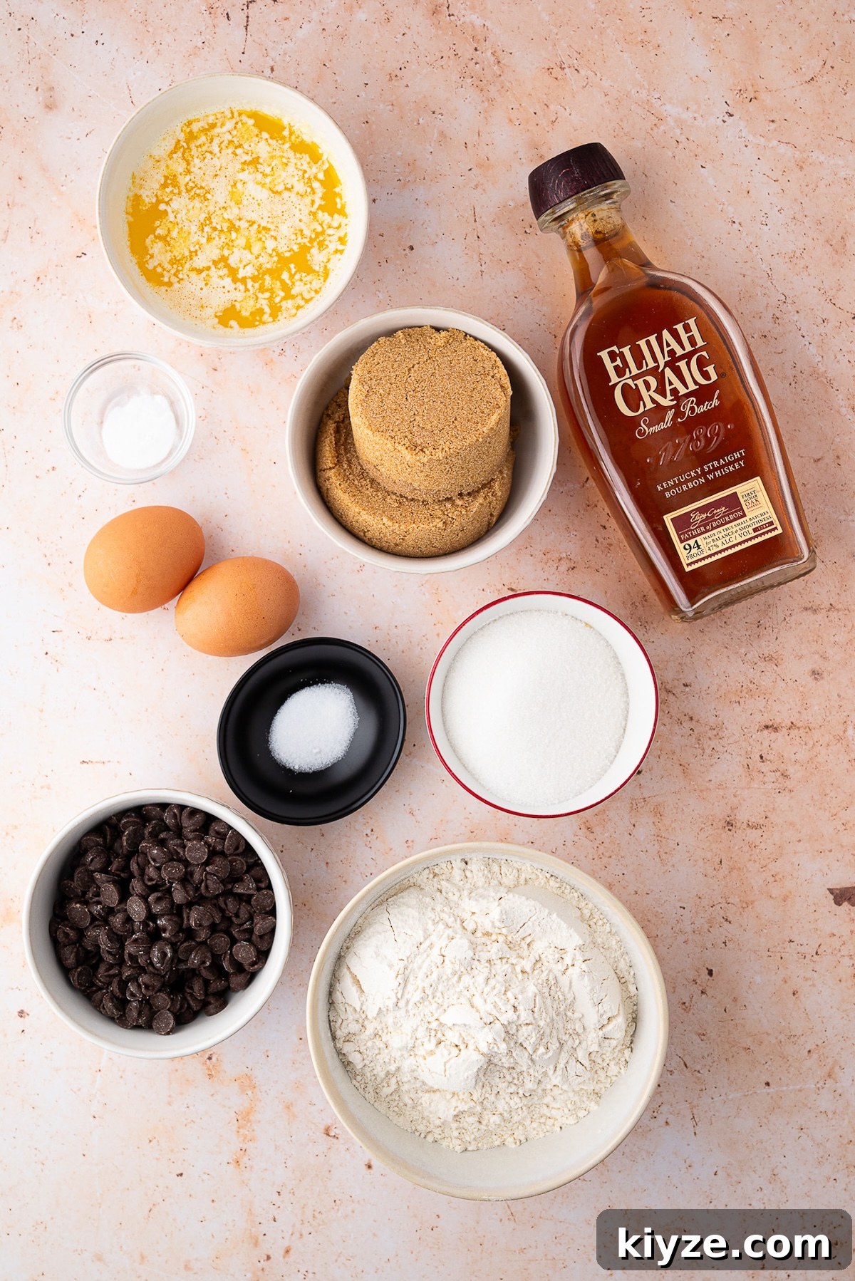 Bourbon Chocolate Chip Cookie Bars Recipe — Rich Boozy Dessert 5 Ingredients for bourbon blondies melted butter, bourbon, brown sugar, eggs, flour, chocolate chips and leavening agents.