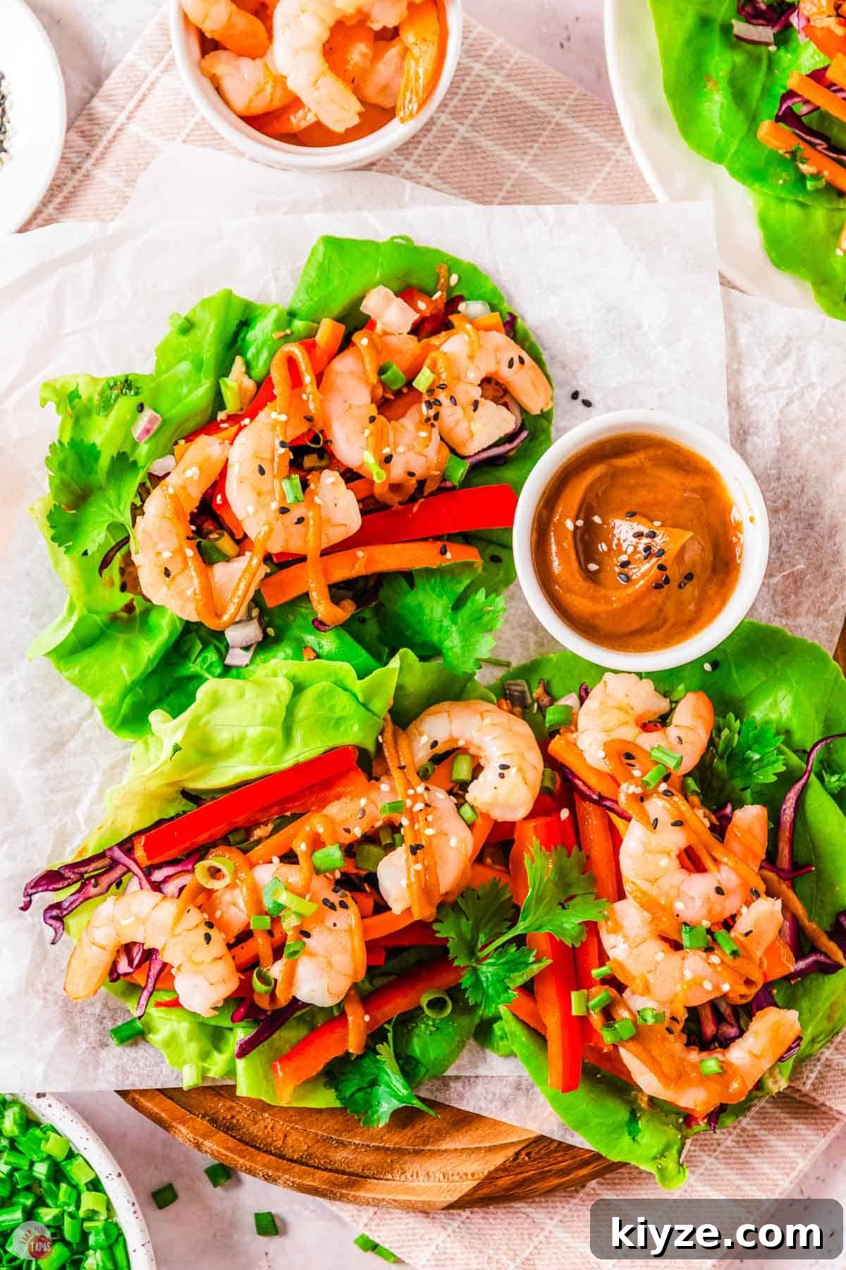 three lettuce wraps with shrimp