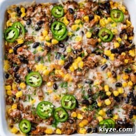 Cheesy Taco Casserole: One-Pan Mexican Dinner Recipe 12 top view of taco casserole on a dish
