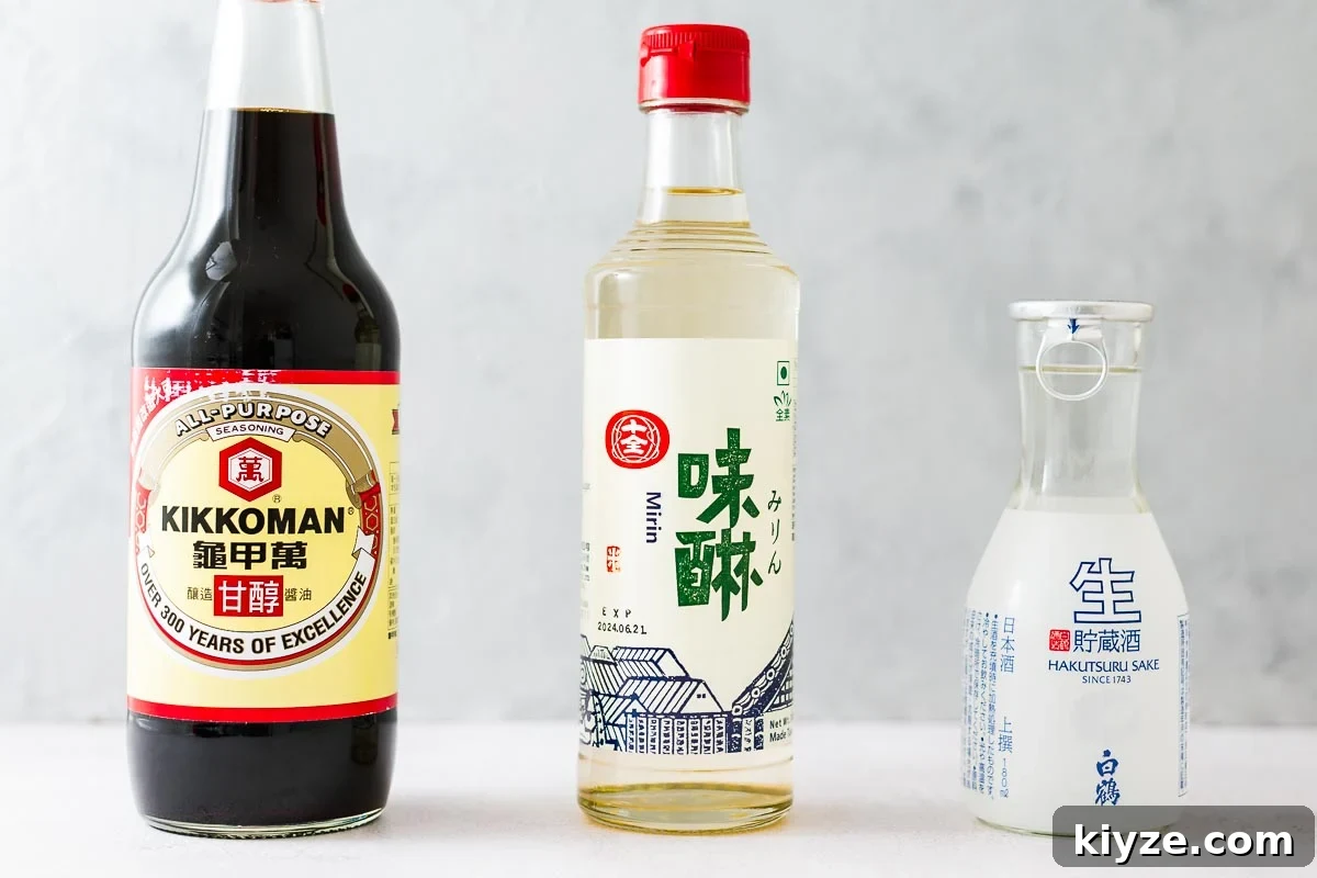 Bottled sukiyaki sauce ingredients including soy sauce, mirin and sake.