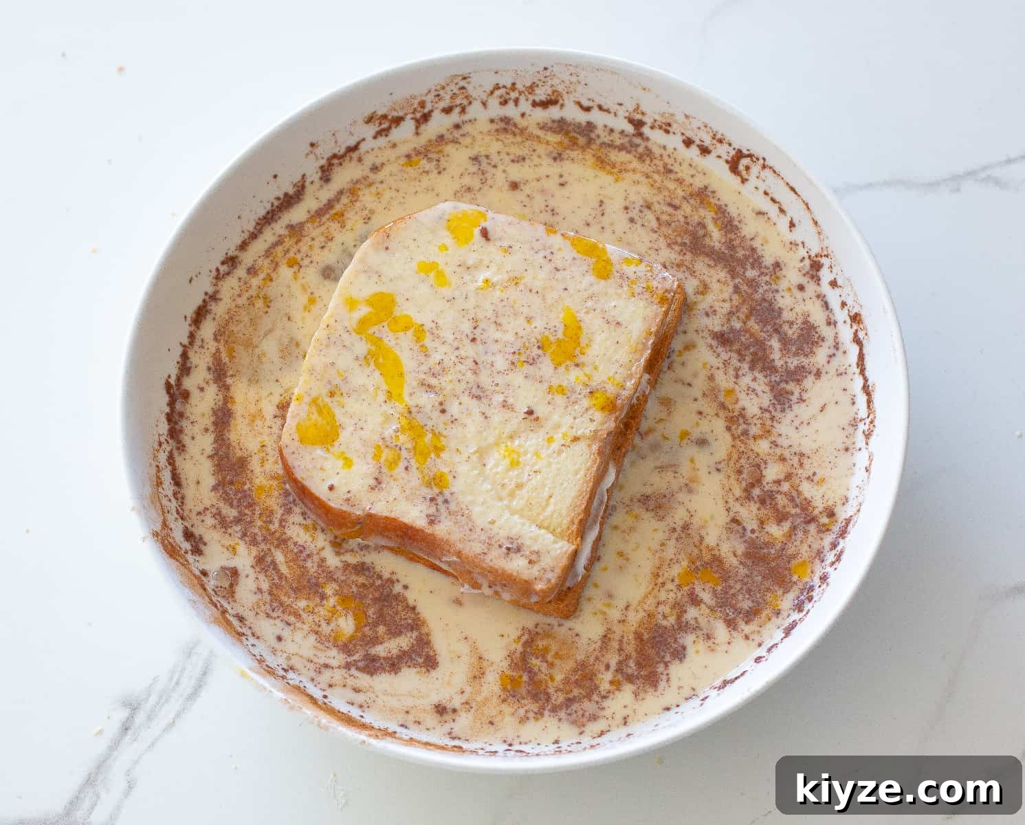 Banana-Stuffed French Toast with Cinnamon Maple Glaze 7 egg mixture