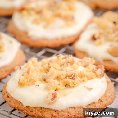 Carrot Cake Cookies with Cream Cheese Frosting Recipe 5 Carrot Cake Cookies with cream cheese frosting on a cooling rack