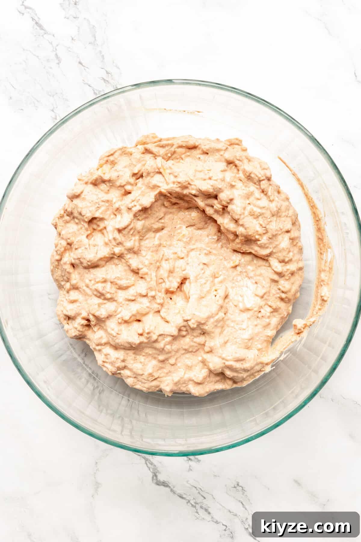 Creamy Cheesy Refried Bean Dip for Parties and Game Day 5 Homemade bean dip in glass bowl.