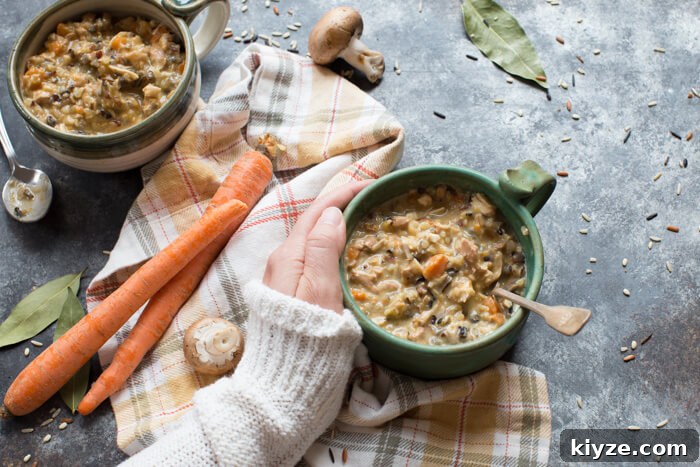 Creamy Turkey and Wild Rice Soup Recipe for Leftovers 3 A bowl of Turkey Wild Rice Soup with tender turkey and mixed wild rice for a comforting meal.