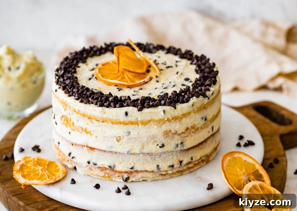 Italian Cannoli Cake Recipe: Classic Sicilian Dessert Guide 2 Finished cannoli cake with chocolate chips and orange slices.