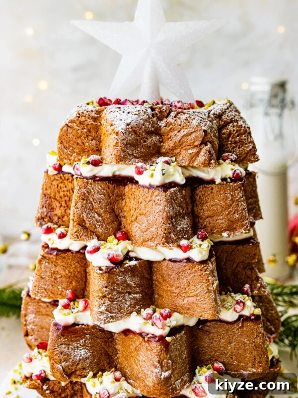 Italian Cannoli Cake Recipe: Classic Sicilian Dessert Guide 19 Pandoro Christmas tree cake topped with a large white star.