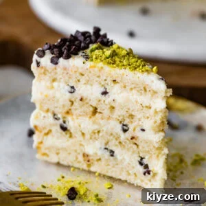 Italian Cannoli Cake Recipe: Classic Sicilian Dessert Guide 25 A slice of cannoli cake on a plate with a fork.