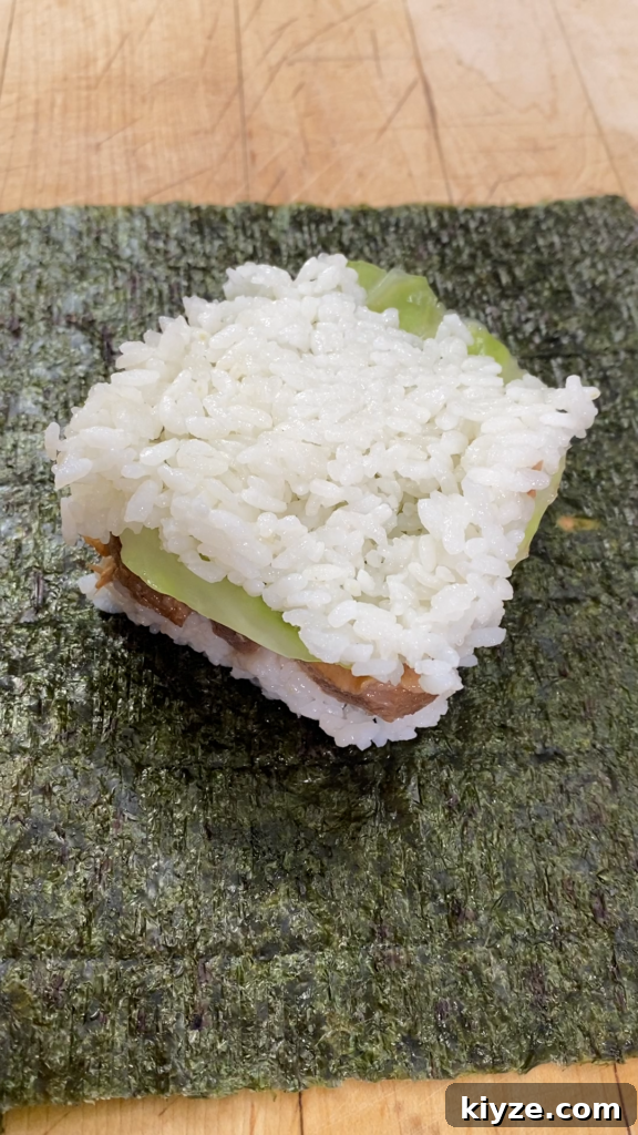 Pork Adobo Musubi Recipe: Filipino Rice Sandwich with Tangy Soy-Vinegar Pork 11 Plated musubi