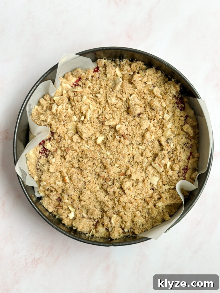 Almond Raspberry Layer Cake with Fresh Raspberry Glaze 10 crumble top added.
