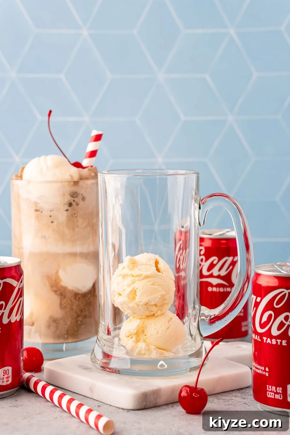 Classic Coke Float Recipe: How to Make the Iconic Soda Float 4 Two scoops of vanilla ice cream in a tall glass beer stein.