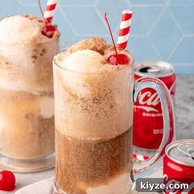 Classic Coke Float Recipe: How to Make the Iconic Soda Float 7 A glass stein filled with a coke float.