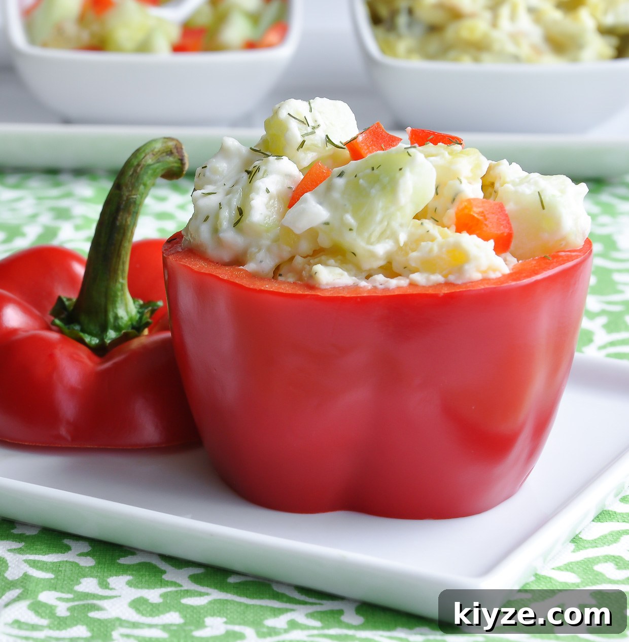 Greek-Style Potato Salad with Feta and Olives 3 Greek Potato Salad served in a hollowed out red bell pepper
