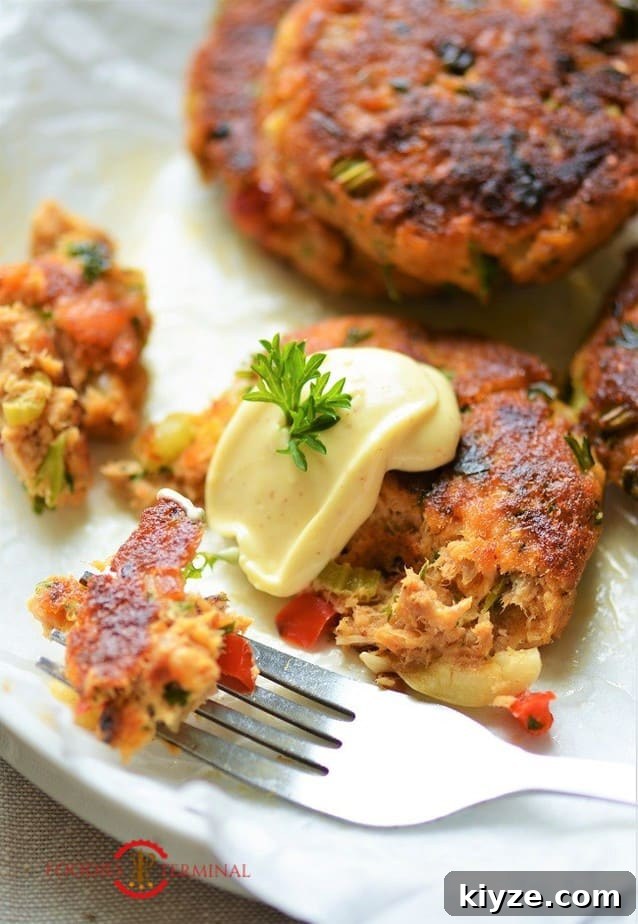 Crispy Salmon Patties Made with Flour: Simple Pan-Fried Recipe 6 Salmon Patties using canned salmon with a dollop of dip