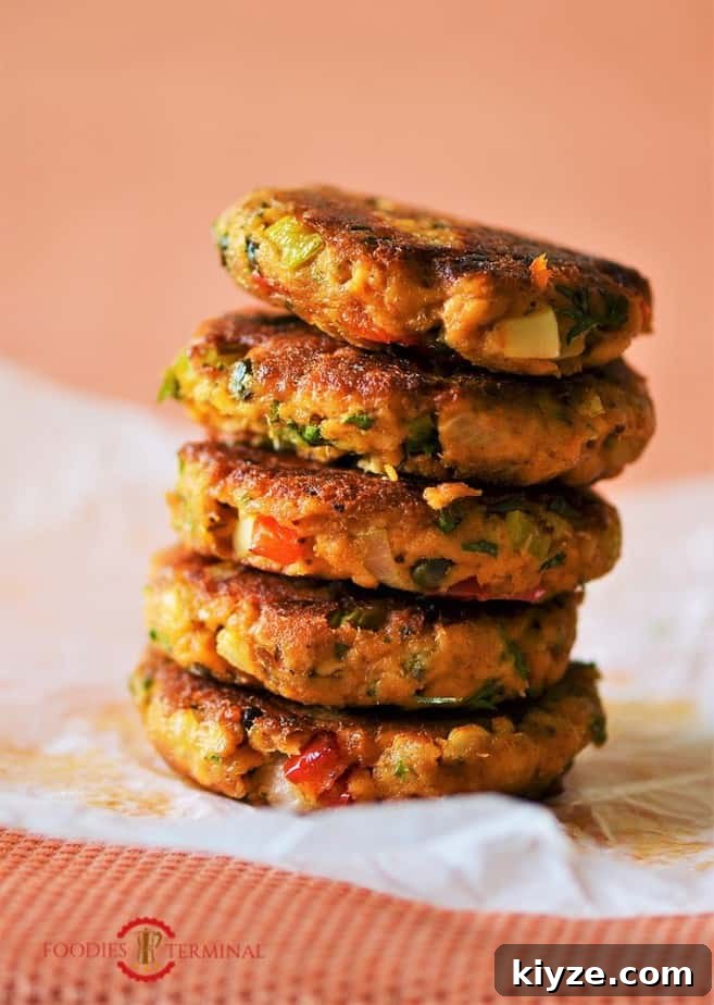 Crispy Salmon Patties Made with Flour: Simple Pan-Fried Recipe 7 Old fashioned salmon patties in a small stack