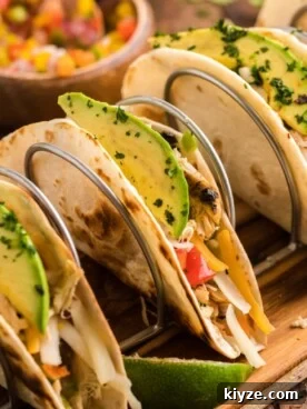 Slow Cooker Chicken Fajitas Recipe for Juicy, Flavorful Meals 8 4 fajitas on a taco tray