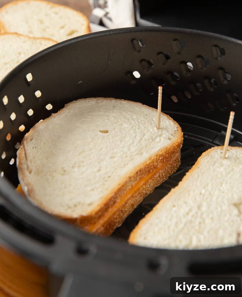Crispy Air Fryer Grilled Cheese Sandwich Recipe 3 how to secure bread and cheese with toothpicks in the air fryer