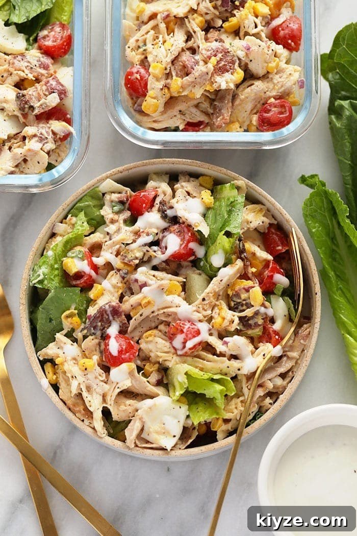 rotisserie chicken cob salad in a bowl ready to be eaten