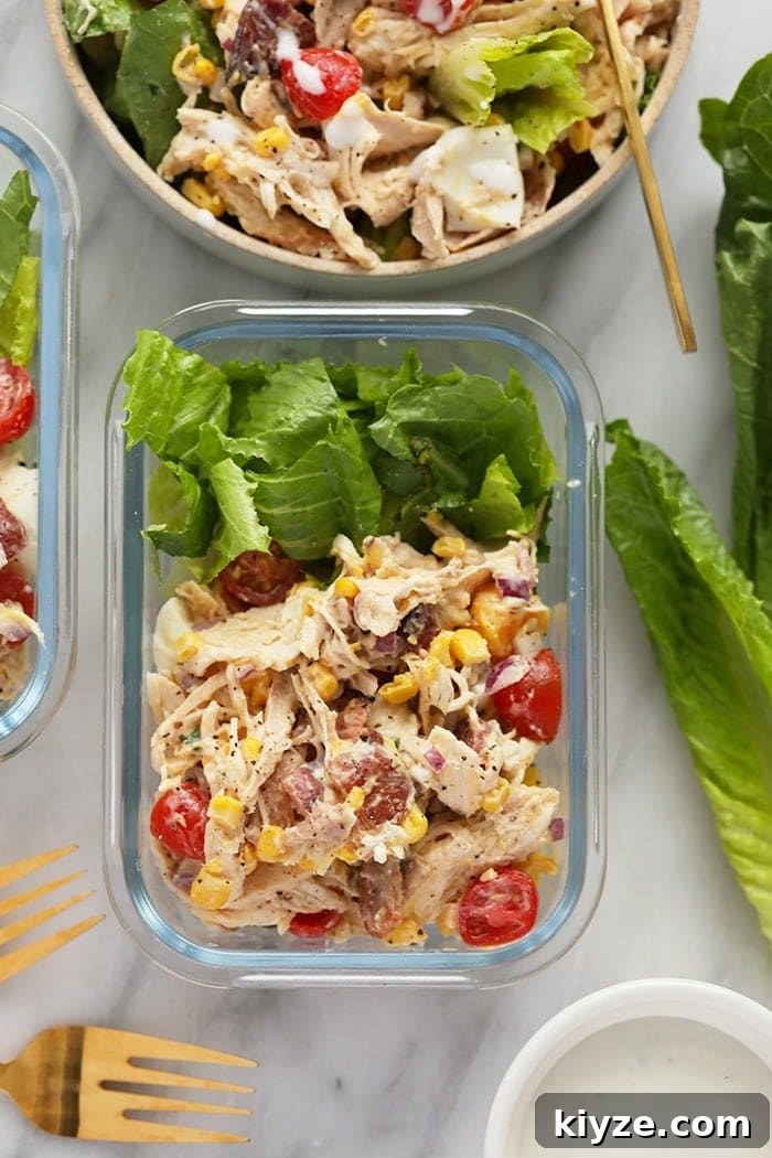 Your lunch for the week is ready in less than 30 minutes with this protein-packed Rotisserie Chicken Cobb Salad! rotisserie chicken cobb salad in a meal prep container