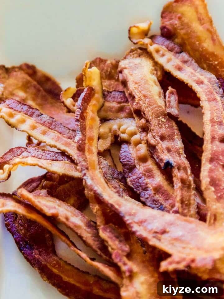 Savory Bacon Ranch Cheese Ball Recipe for Parties 5 A pile of strips of crisp bacon