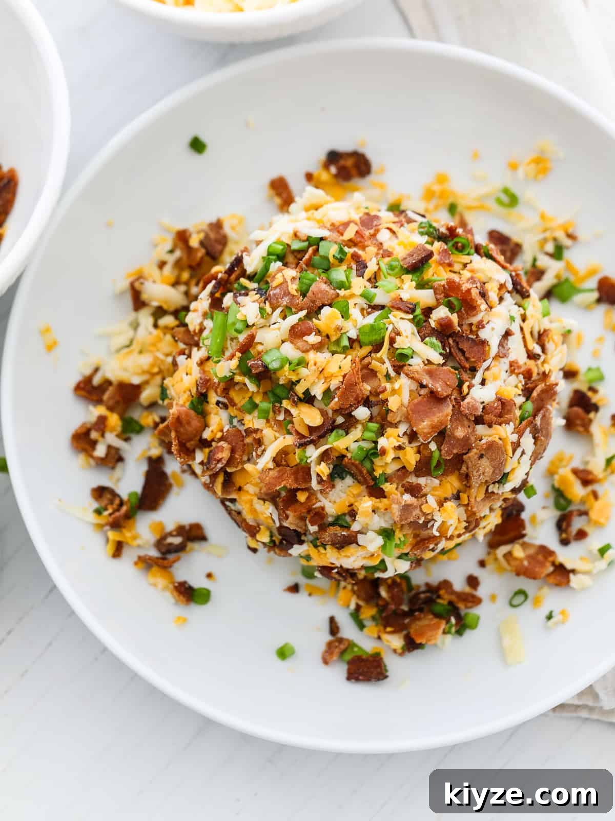 Savory Bacon Ranch Cheese Ball Recipe for Parties 6 Bacon cheese ball coated with toppings
