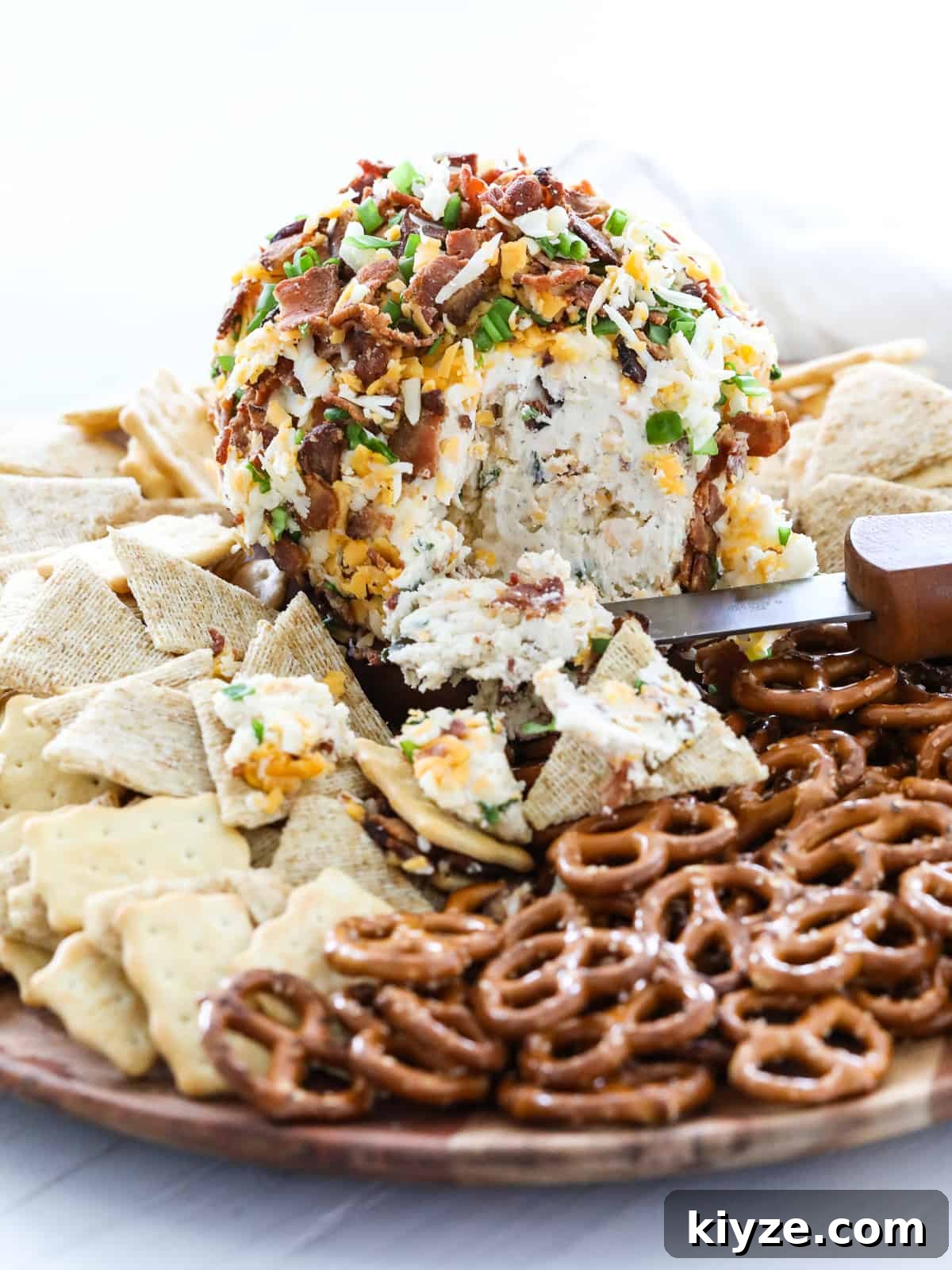 Savory Bacon Ranch Cheese Ball Recipe for Parties 10 Round cheese ball with bacon and cheddar