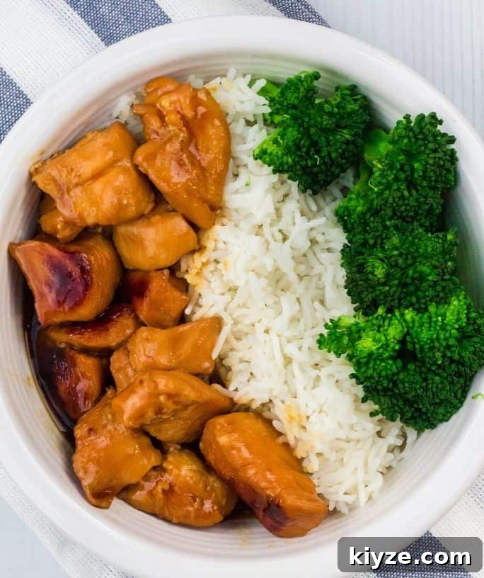 Top Instant Pot Asian Recipes for Flavorful Weeknight Meals 9 white bowl of teriyaki chicken, rice, and broccoli
